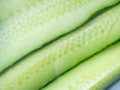 Sliced Ã¢â¬â¹Ã¢â¬â¹cucumber on a white background. Vegetable isolate. Healthy diet. Cucumber cut lengthwise Royalty Free Stock Photo